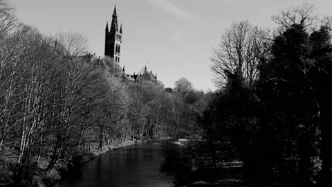 Landscape of river and trees with old building in the background Video stock 171800914