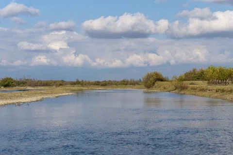 Landscape with a river in the floodplain of the river. Stock Photos