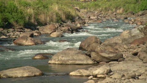Landscape with river rapids and rocks, Lamjung District, Nepal Video stock 139689518