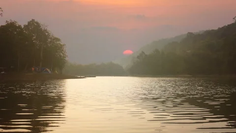 Landscape of river view during the sunrise time with camping tent at campsite Stock-Footage 133517566