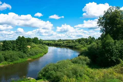 Landscape. river view with trees. blue sky with clouds Stock-Fotos
