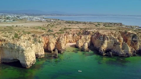 Landscape of rocky coastline and city Stock Footage