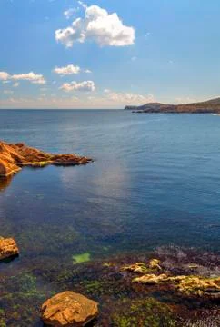 Landscape on rocky shore Stock Photos