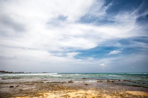 Landscape rocky tropical beach. Stock Photos
