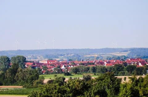 Landscape. Rooftops. in the background wind generators 写真素材