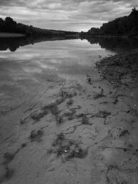 Landscape of the Sava river during a cloudy gloomy day Stock Photos