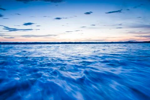 Landscape of sea with dramatic wave in sunset. Stock Photos