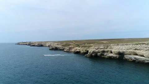 Landscape of the sea smooth surface next to the land Video stock 103084041