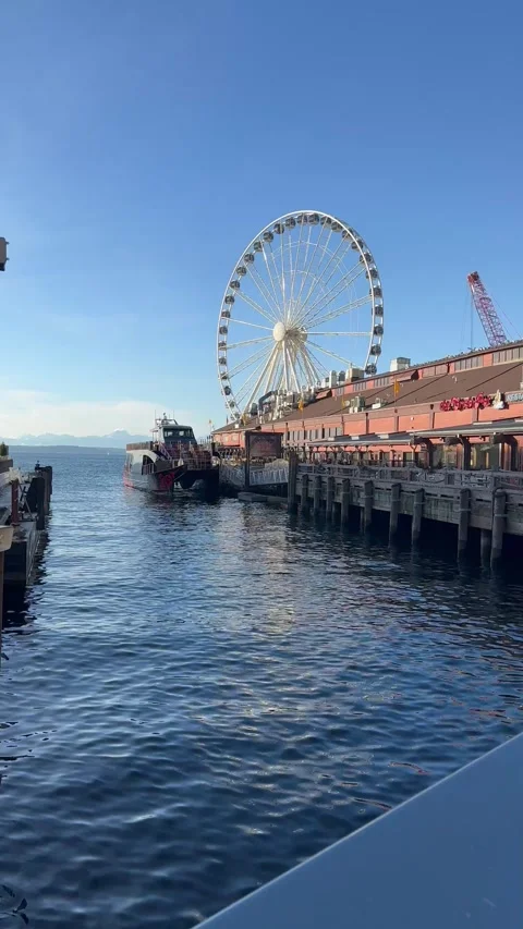 Landscape seafront seattle view wheel bay cafe sky mountains Stock Footage 241030646