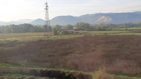 Landscape seen through window on train trip Stock Footage 132022615