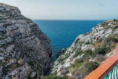 Landscape shot looking down cliffs on the Maltese south coast 스톡 사진