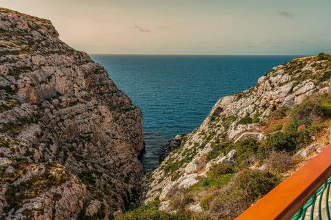Landscape shot looking down cliffs on the Maltese south coast near blue grotto Stock Photos