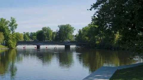 Landscape shot of a small bridge and dam in a small town Video stock 337889517