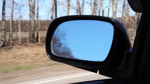 Landscape in the side view mirror of a car , on road countryside Stock Footage 108061592