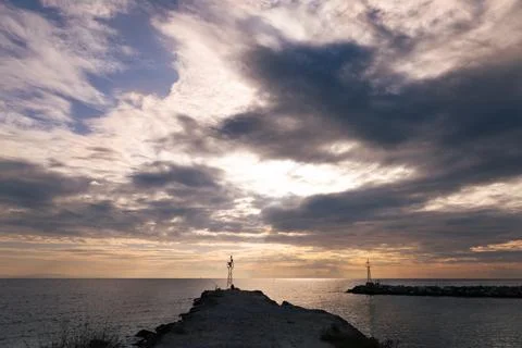 Landscape of sky with lighted clouds. Beautiful clouds over the sea Stock Photos
