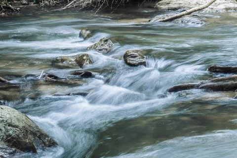 Landscape of a small stream in klong Lan national park of Thailand Stock Photos