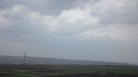 Landscape of sunset with cloudy orange sky and a small lonely silhouette of tree Stock Footage 62484049