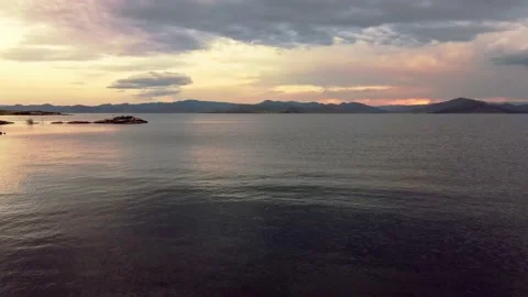 Landscape - sunset on the coast, waves, horizon. top view. Stock Footage 138098128