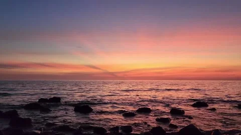 Landscape sunset sky over ocean sea as water wave in the island as dawn sky  Stock Footage 231961292