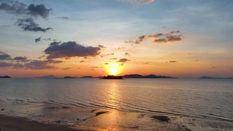  Landscape with sunset sky over ocean sea as water wave in the island  Video stock 232125698