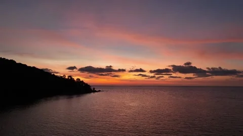 Landscape sunset sky over ocean sea as water wave in the island as dawn sky  Video stock 232477520