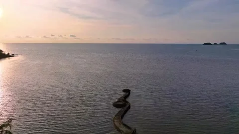 Landscape sunset sky over ocean sea as water wave in the island as dawn sky  Stock Footage 232477524
