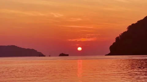 Landscape with sunset sky over ocean sea as water wave in the island Stock Footage 237749470