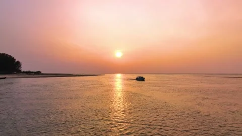 Landscape with sunset sky over ocean sea as water wave in the island as dawn sky Video stock 238826624
