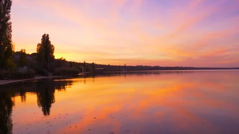 The landscape of the sunset sky on the sea of looping colors Stock Footage 121540772