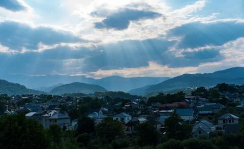 Landscape at sunset sunlight through the clouds Stock Photos