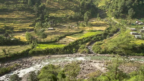 Landscape with terraced fields and river, Lamjung District, Nepal Video stock 139689506