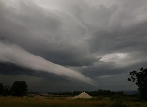 Landscape with threatening storm clouds. Stock Photos