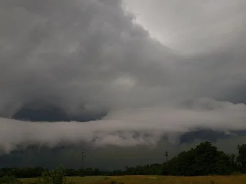 Landscape with threatening storm clouds. Stock Photos