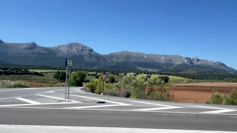 Landscape through the car window. Meadows and mountains. Video stock 313267251