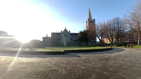 Landscape Timelapse of St Patricks cathedral in Dublin at glowing sunrise with Stock Footage 327829534