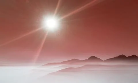 Landscape with toned layers of mountains and haze in the valleys Stock Photos