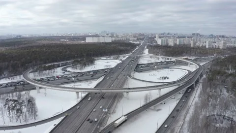 Landscape with traffic at the junction of the ring road on a sunny winter day. Stock Footage 171611447