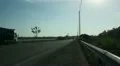 Landscape trucks and traffic on main road in Bali HD Footage