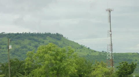 Landscape with trucks driving by Stock Footage 43184464