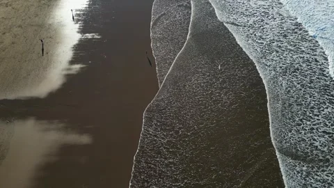 Landscape video drone man running beach Stock Footage 258834798