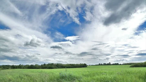 Landscape View and fast moving clouds - timelapse Stock Footage 38502974