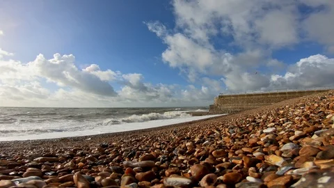 Landscape view of beach and waves dancing on the sea. Stock Footage 100754522
