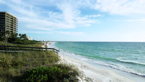 Landscape View of Beach Boardwalk and Waves Crashing Stock Footage 167809322