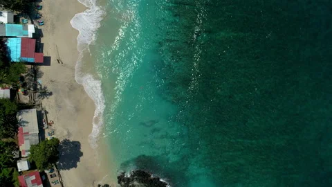 Landscape view of beautiful footage while turquiose sea waves breaking on sandy Stock Footage 223700982