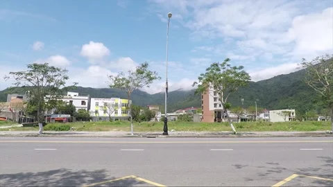 Landscape view behind Da Nang beach road, Vietnam Stock Footage 172399997