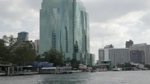 Landscape view of chaophraya river with skyscraper hotel building on the ri.. Stock Footage 246467658
