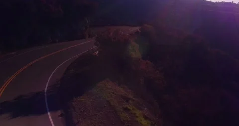 Landscape view of empty winding mountain road Stock Footage 136337853