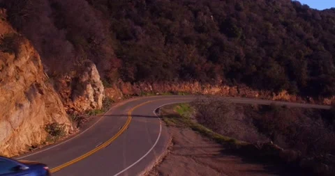 Landscape view of empty winding mountain road Stock Footage 136338862
