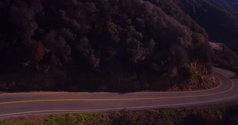 Landscape view of empty winding mountain road Stock Footage 136338871