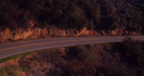 Landscape view of empty winding mountain road Stock Footage 136340467